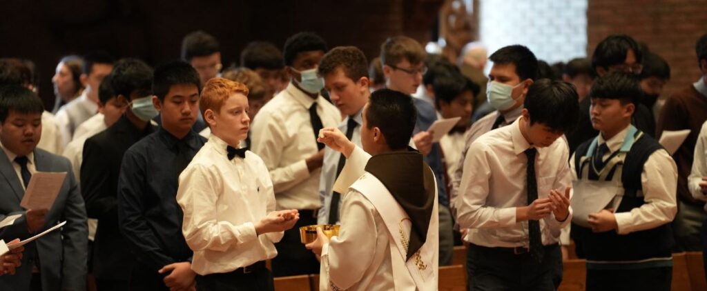 Communion at Mass at Saint Lawrence Seminary
