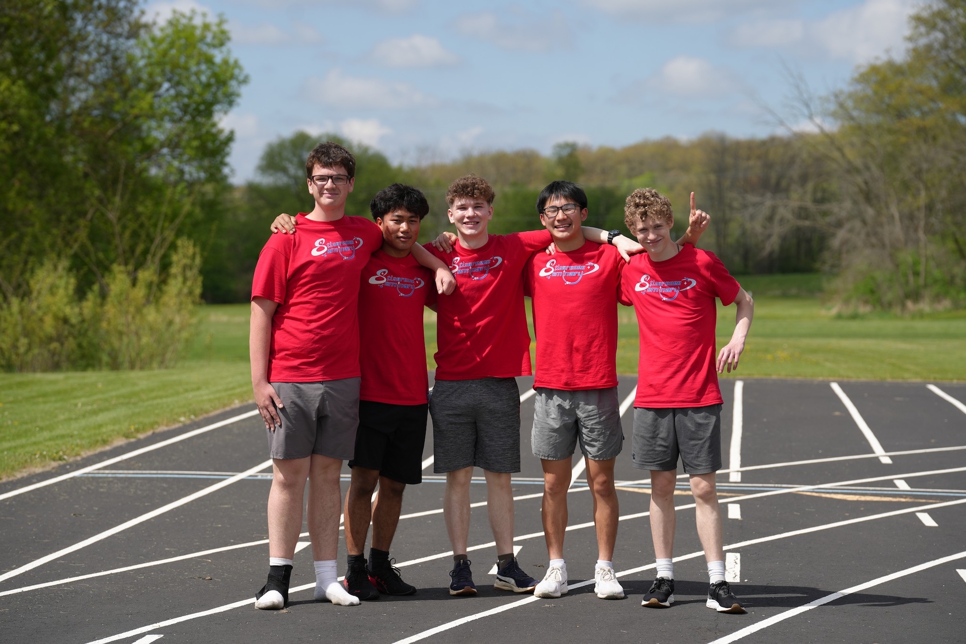 Seminarian student athletes on track